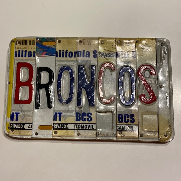 Hand Crafted Other - Broncos license plate sign. Made of wood and license plate letters.